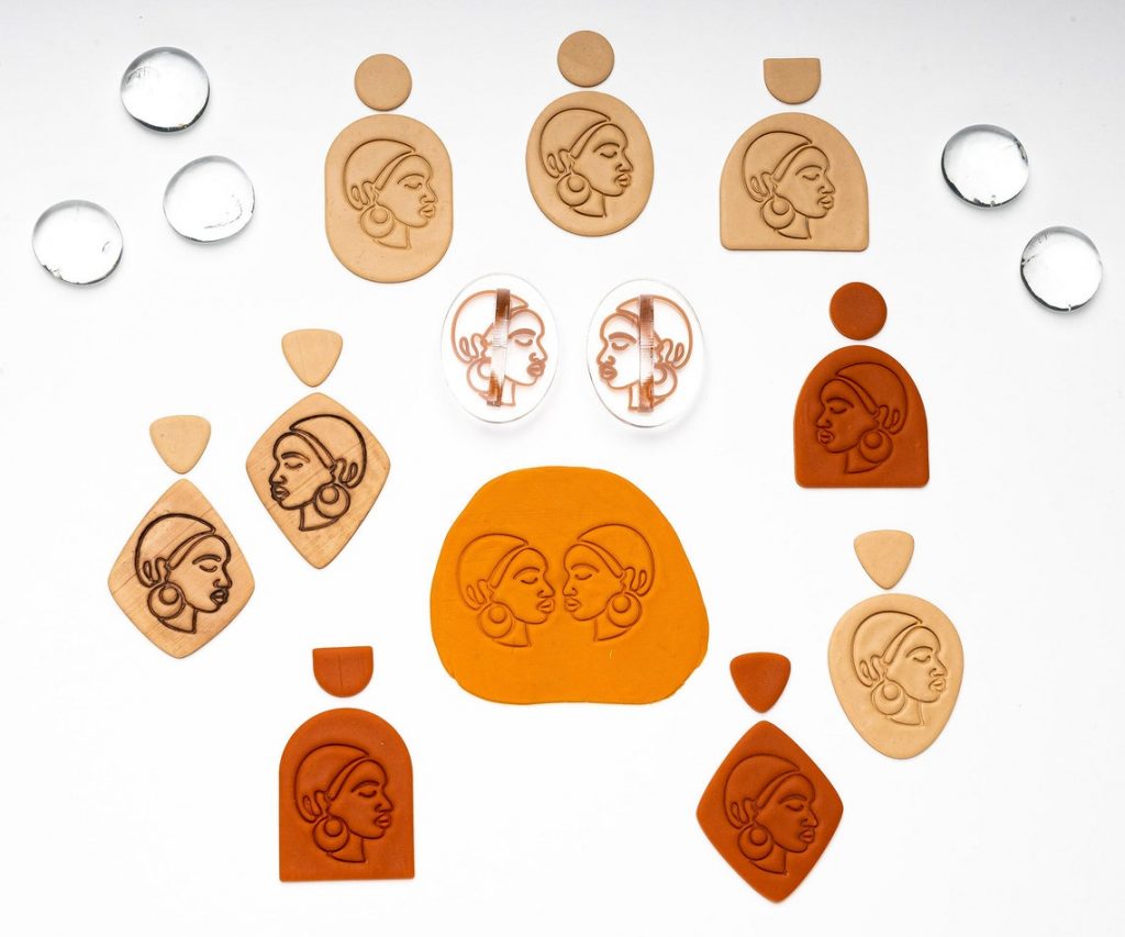 African woman face CAD stamps